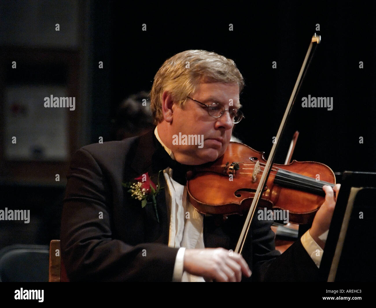 Concertmaster Sigmar Martin in concert with the International Symphony Orchestra Stock Photo Alamy