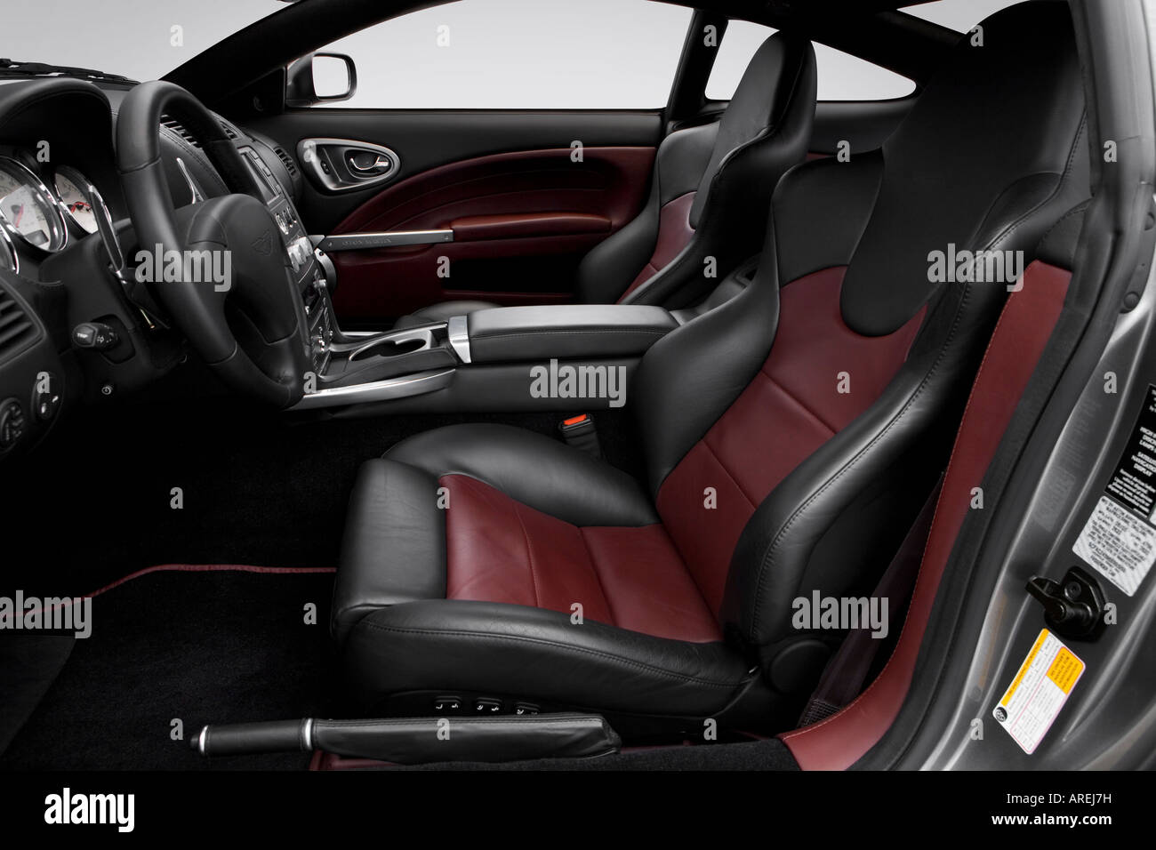 2006 aston martin v12 vanquish s in silver - front seats stock photo