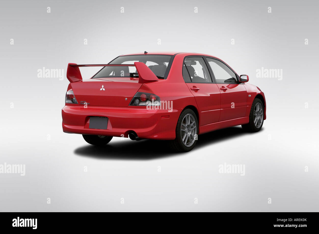 06 Mitsubishi Lancer Evolution Ix In Red Rear Angle View Stock Photo Alamy