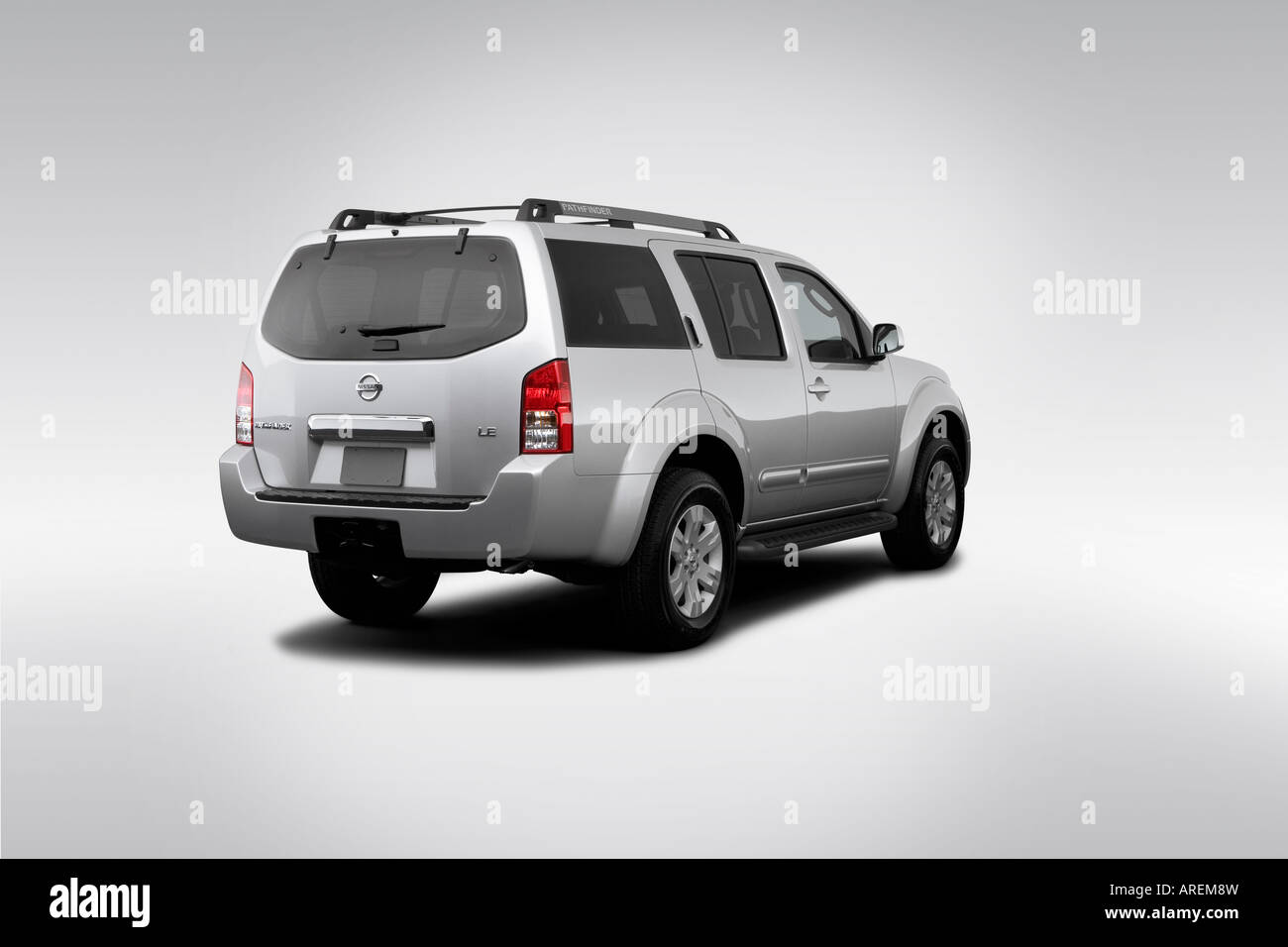 2006 Nissan Pathfinder LE in Silver - Rear angle view Stock Photo