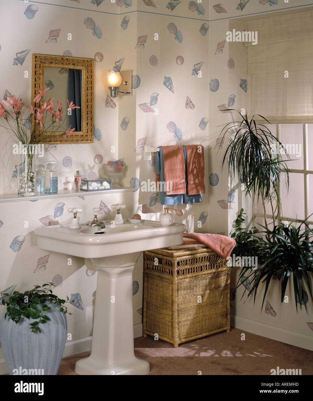 room interior bath vanity ceramic sink pedestal wicker clothes hamper