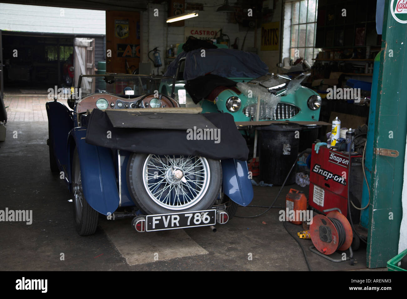 Classic motor cars being restored Fisher's garage Walberswick Suffolk