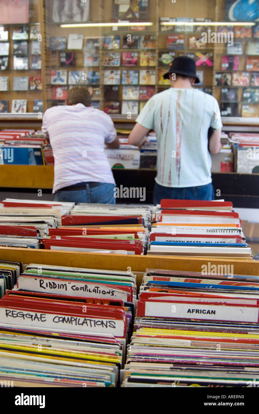 Young people browsing through music vinyl LPs in record shop in Notting  Hill, London England UK Stock Photo - Alamy
