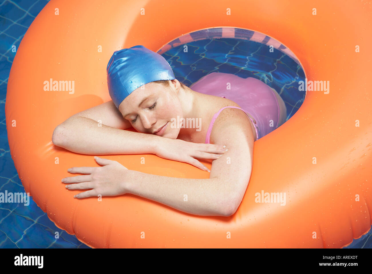 Woman resting in rubber ring Stock Photo