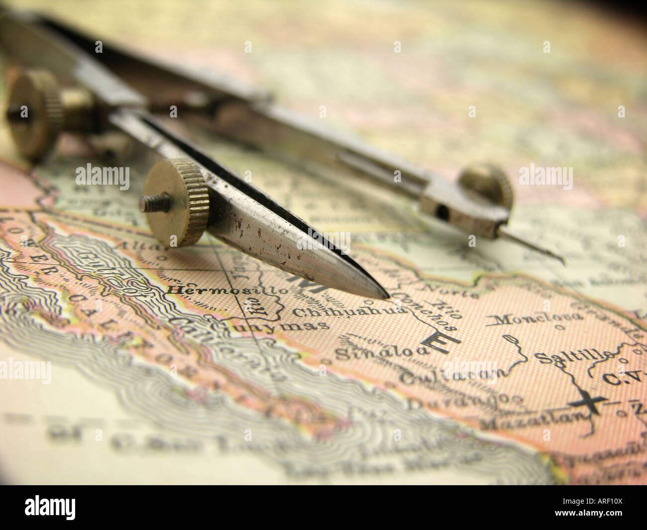 Drafting Compass on Map Stock Photo