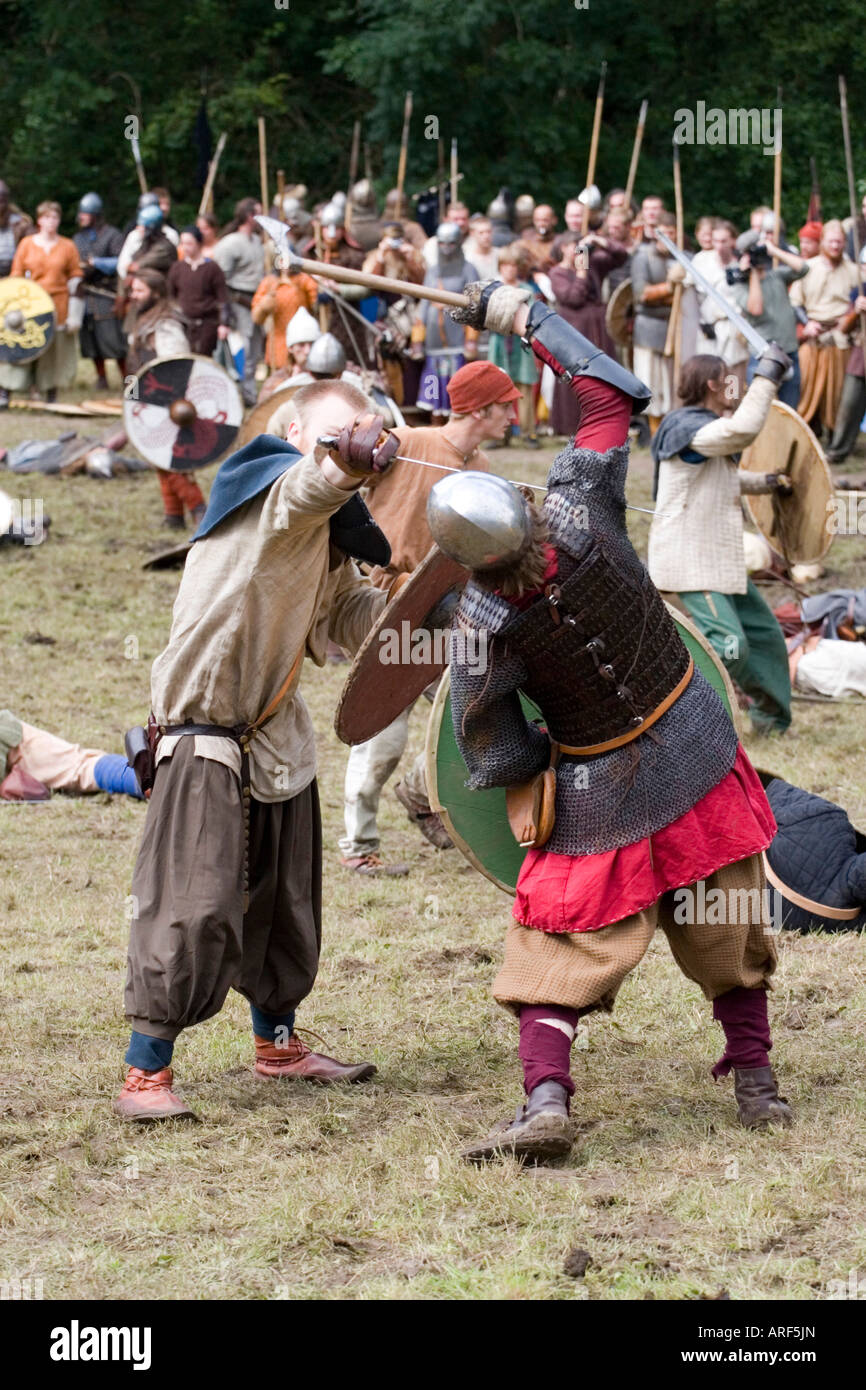 Viking warriors in close quarters fighting at a battle re-enactment in Denmark Stock Photo