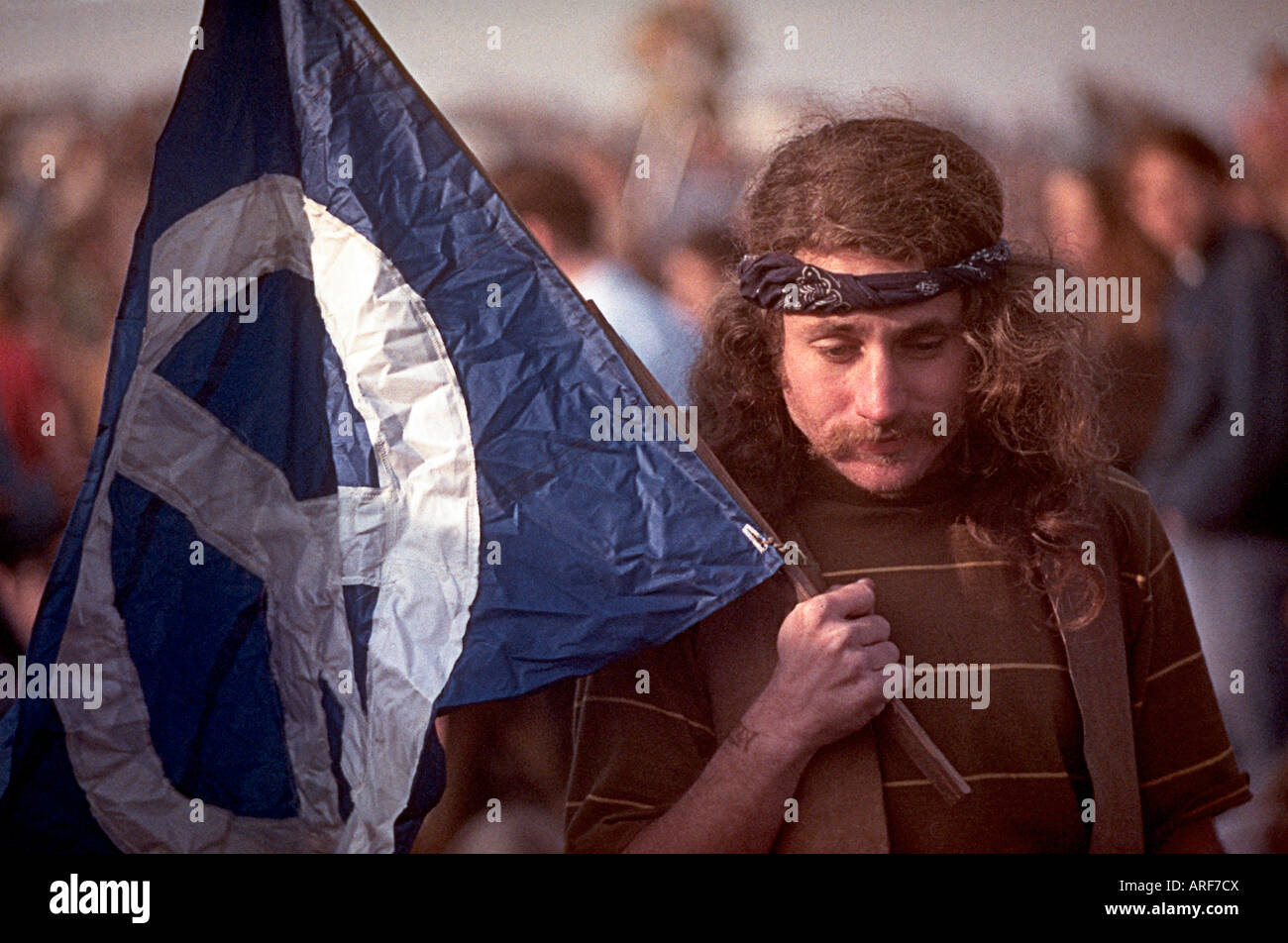 Concert goer with peace flag Free Rolling Stones concert at Altamont Speedway December 1969 Stock Photo