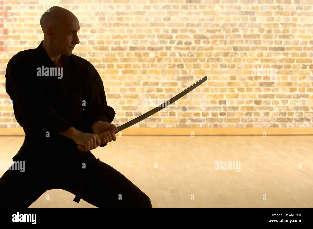 Karate man with Samurai sword Stock Photo Alamy