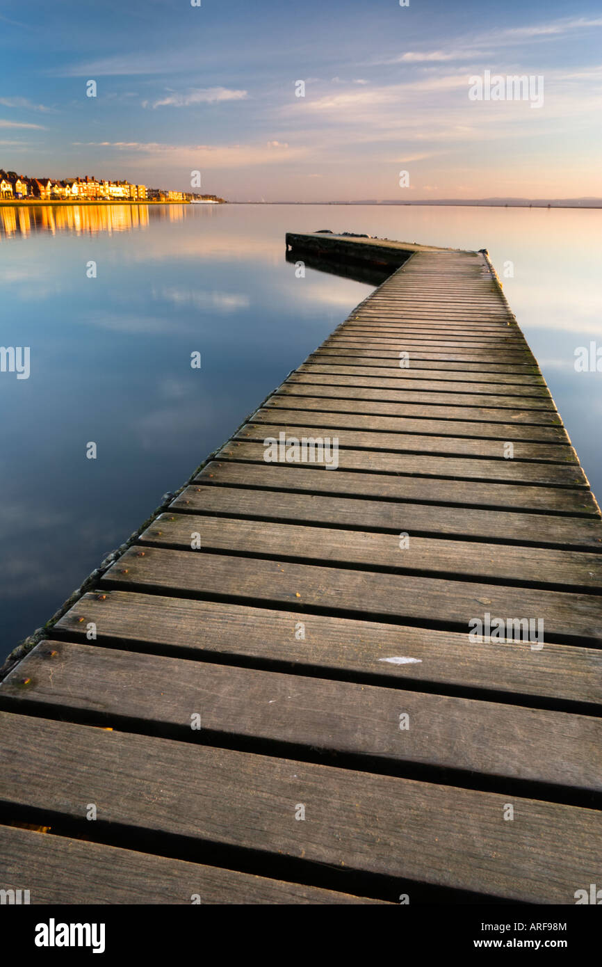 Sunset phtograph of one of the Walkways at West Kirby Marine Lake Stock Photo