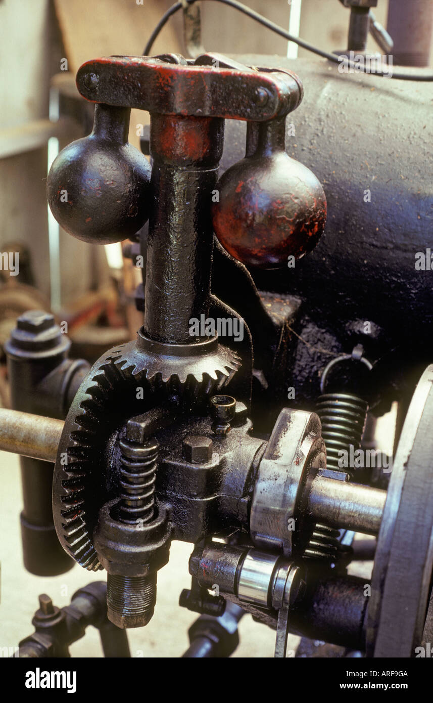 antique oil well pump engine gears energy source exploration petroleum