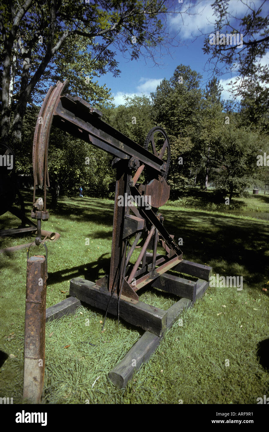antique oil well pump energy source exploration petroleum resource Stock Photo