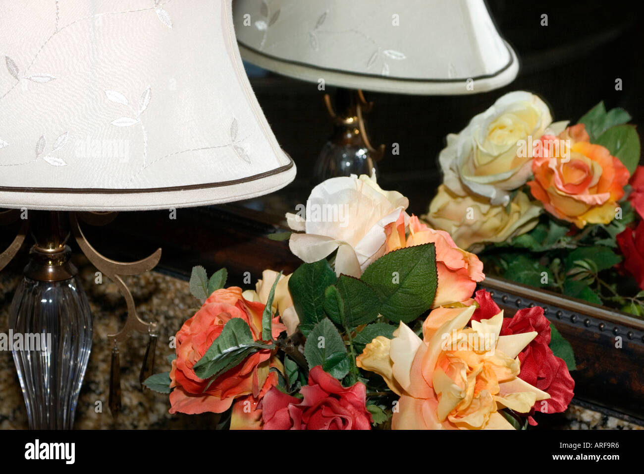 Flowers lamp in mirror Stock Photo