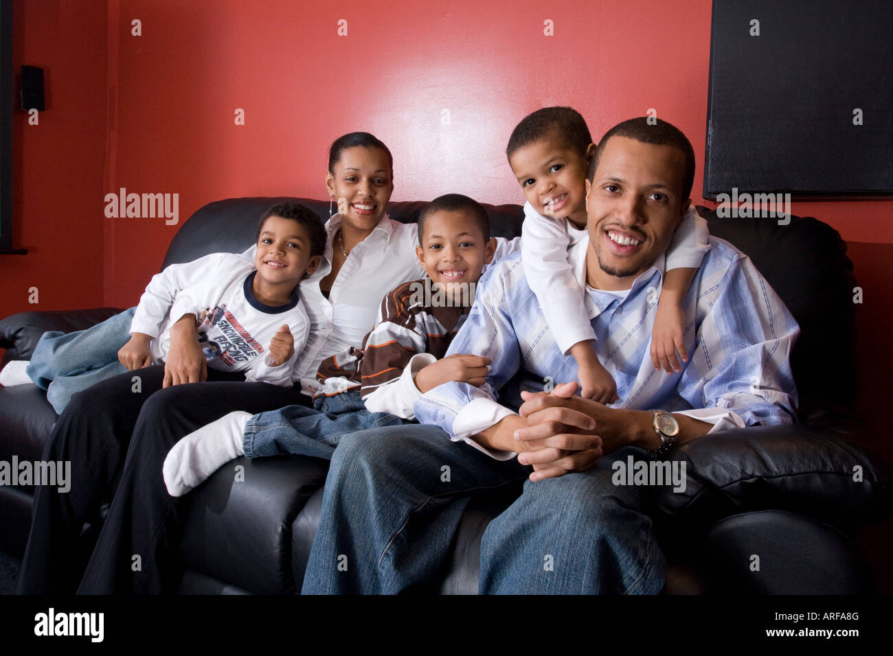 Happy family that moved from New York into a New Mixed income Housing development in New Haven, Connecticut USA Stock Photo