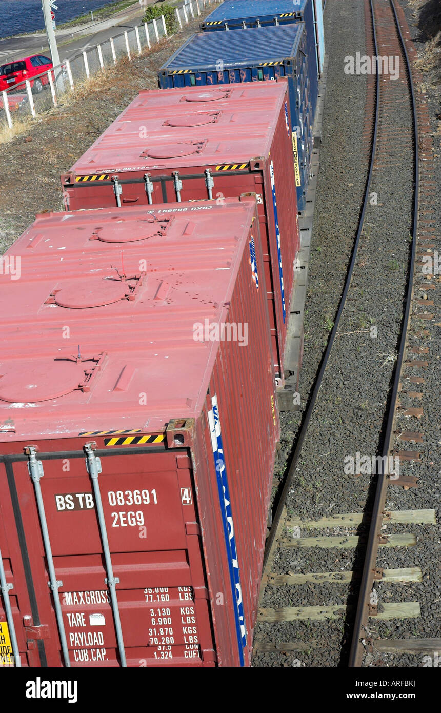 Shipping Containers being transported by rail Stock Photo Alamy