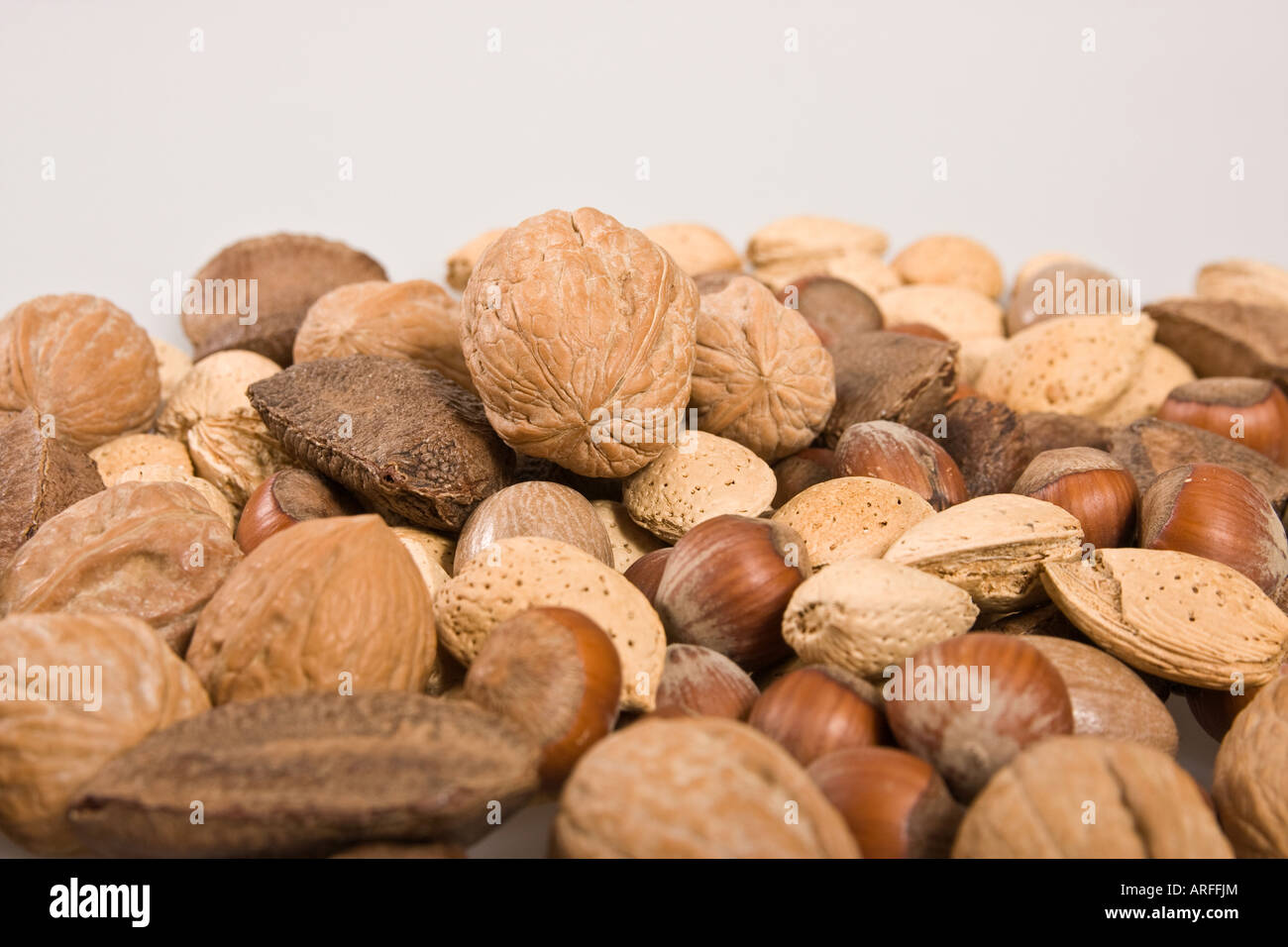 Closeup of nuts various nuts in shells food from above overhead nobody