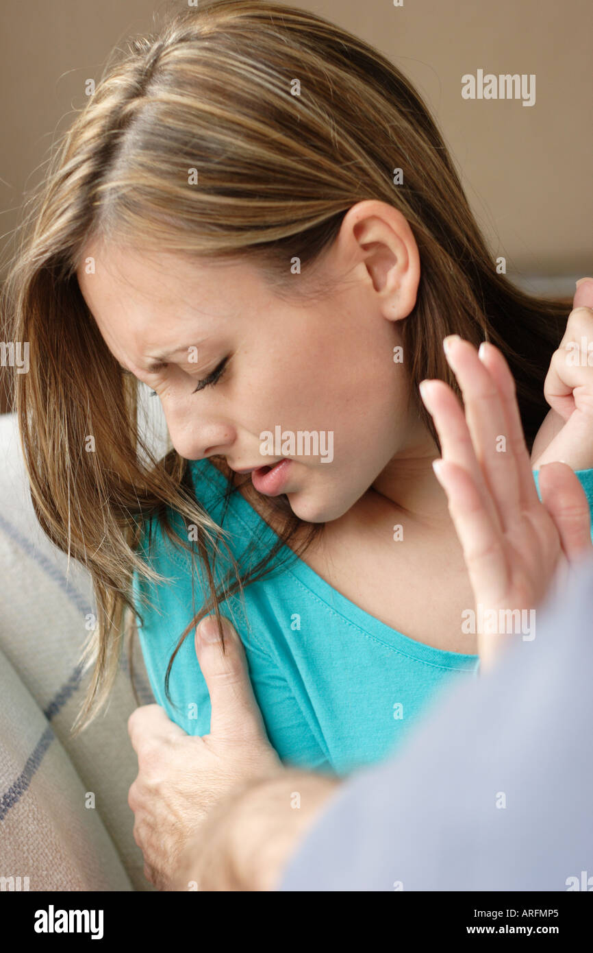 young woman being attacked Stock Photo