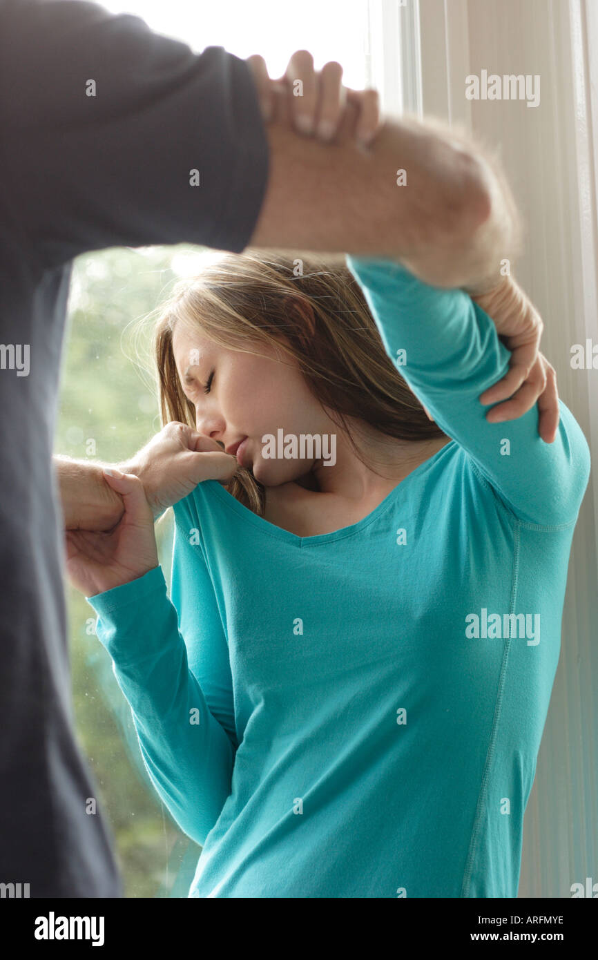 young woman being attacked Stock Photo