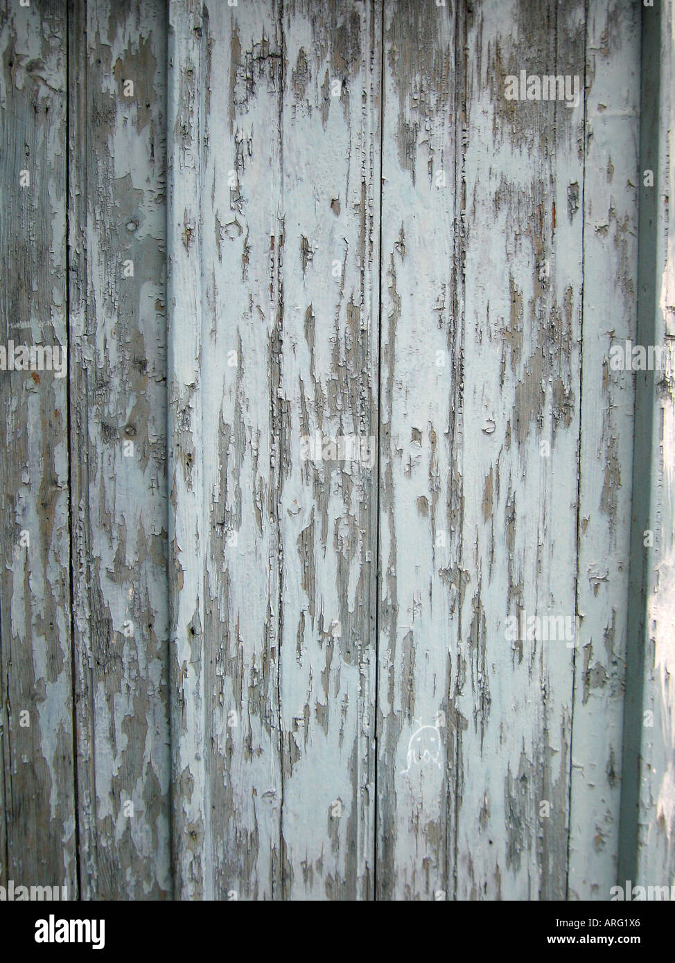 Weathered white paint on doorway Stock Photo