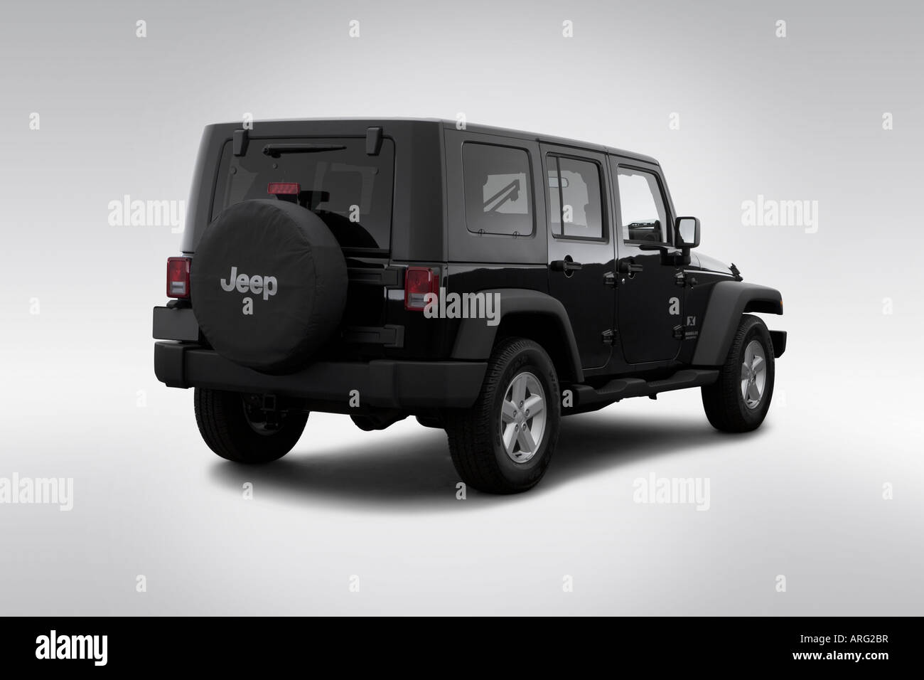 2007 Jeep Wrangler Unlimited X in Black - Rear angle view Stock Photo -  Alamy