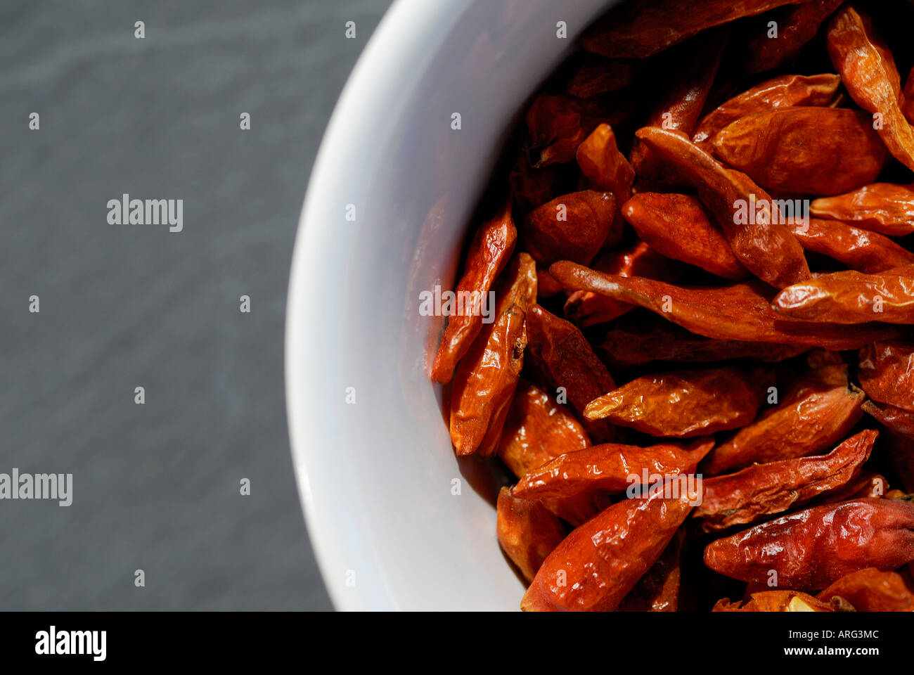 bowl of dried red chilli peppers Stock Photo