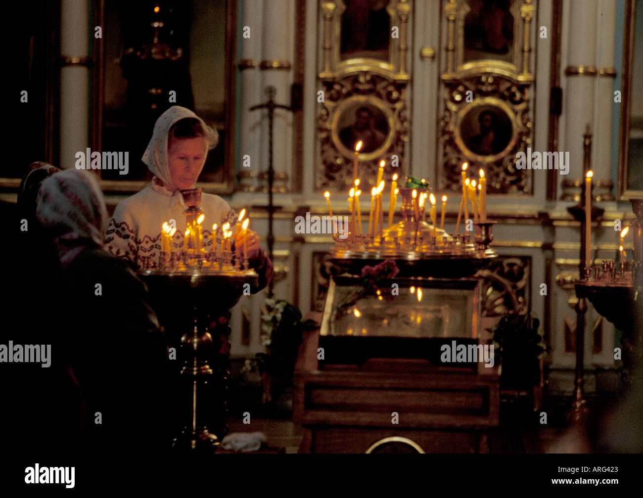 candle lighting in cathedral Stock Photo Alamy