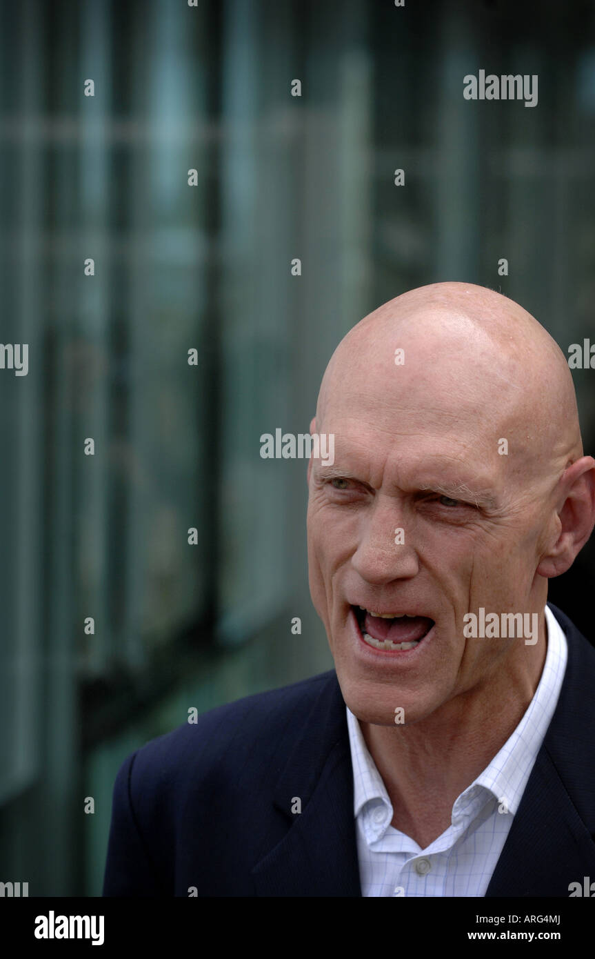 Minister for the Environment , Heritage and the Arts Peter Garrett speaks to media at Trigg Beach in Perth , Western Australia . Stock Photo
