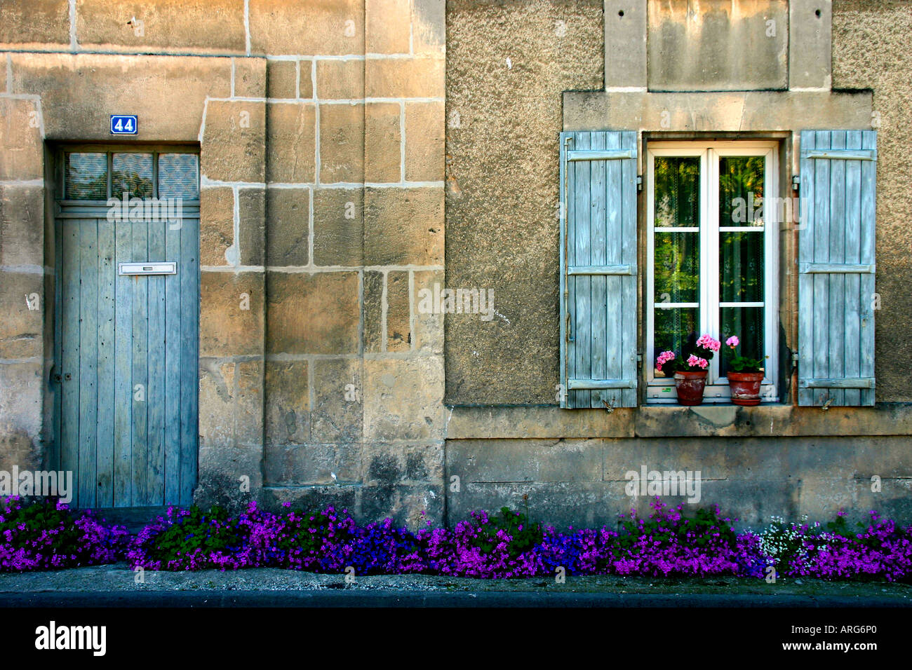 The Door and Window of a Cottage in the Charente Maritime Region of Western France Stock Photo