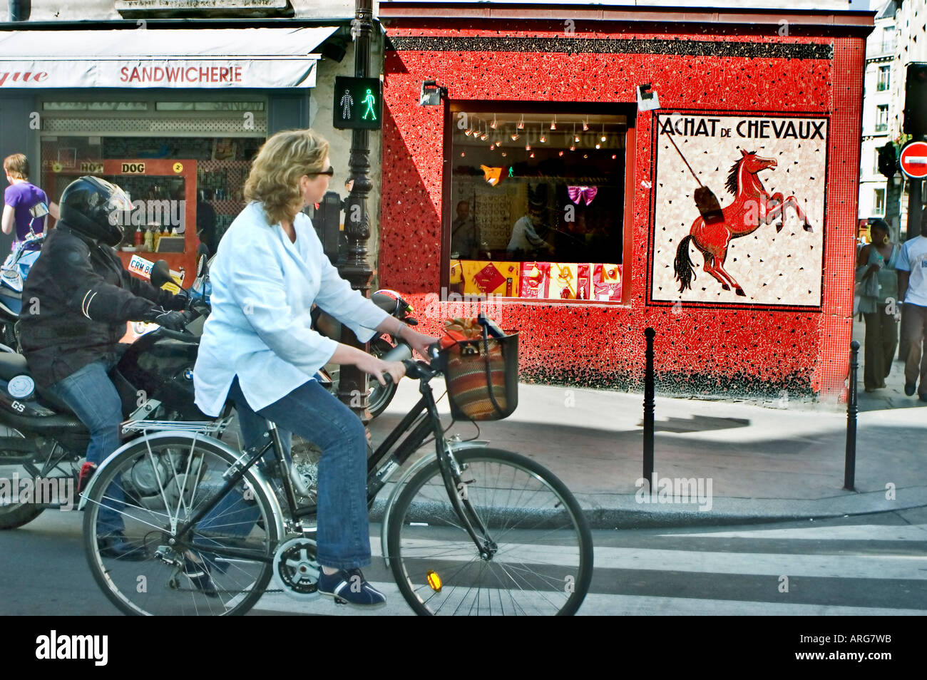 PARIS Marias, France, Street Scene with Horse Butcher Shop Vintage French  Advertising mosaic on Wall Woman on Bicycle, old French storefront Vintage  Stock Photo - Alamy