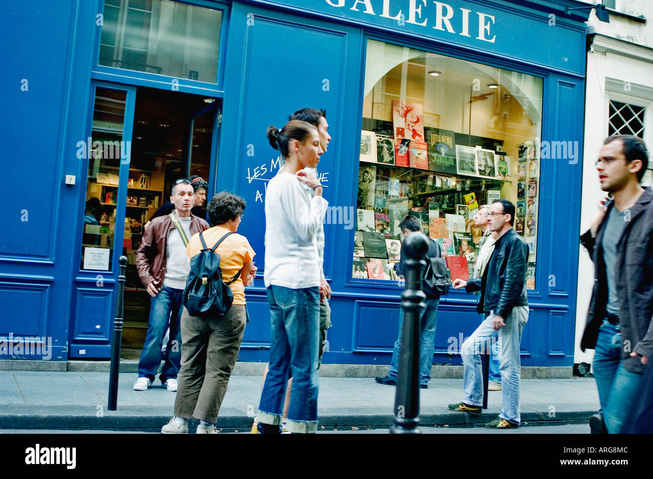 PARIS France, Street Scene with Facade of 'Les Mots à la Bouche' Gay Bookstore crowd people walking, old French storefront, small book store Stock Photo