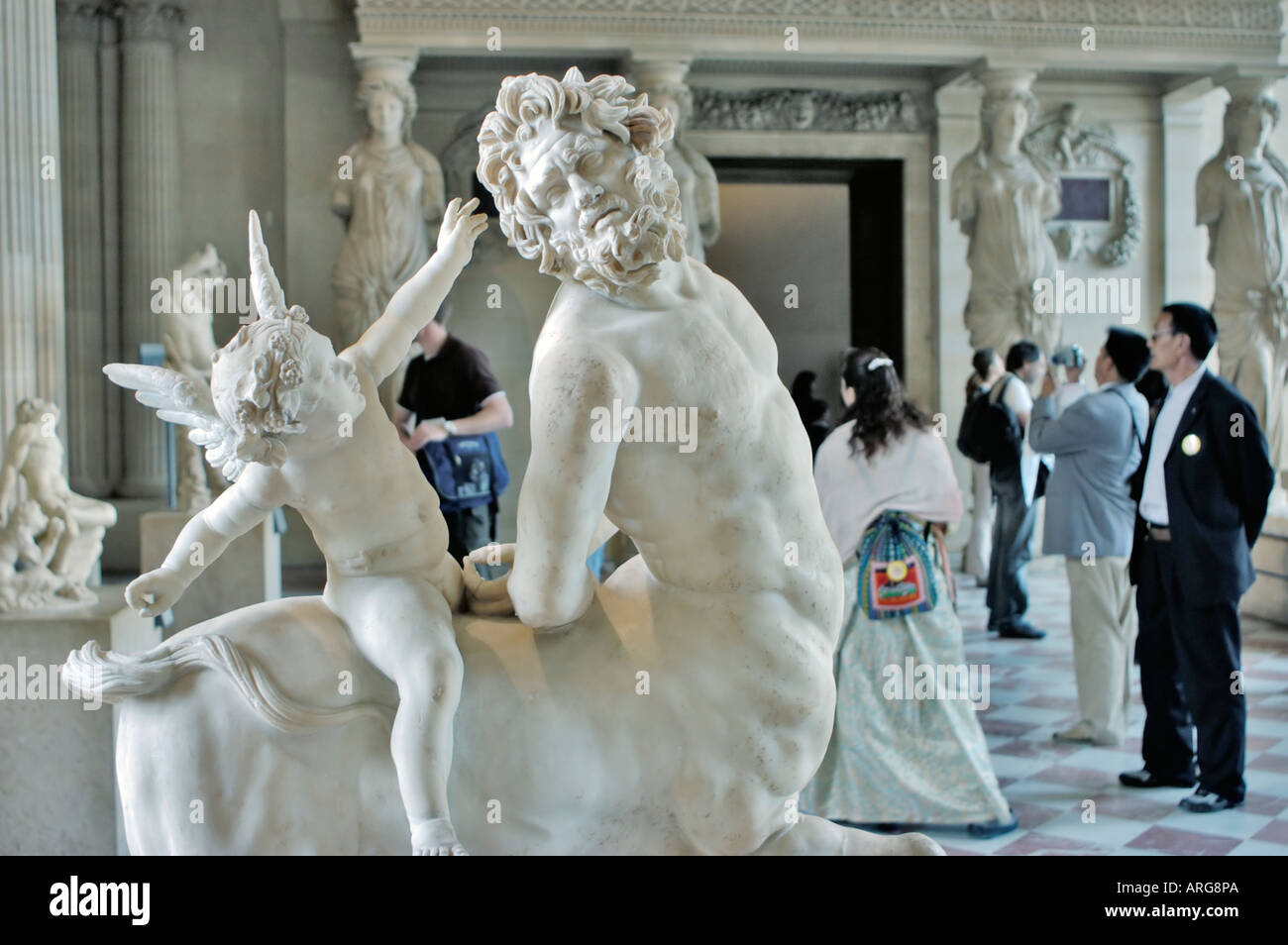 Paris France, Chinese People Looking Monuments Interior Louvre Museum Statue  "Centaur Straddled by the God of Love" Le Centaur chevaucé par l'Amour" i  Stock Photo - Alamy