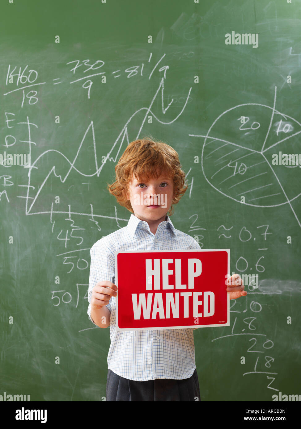 Boy Holding Help Wanted Sign Stock Photo