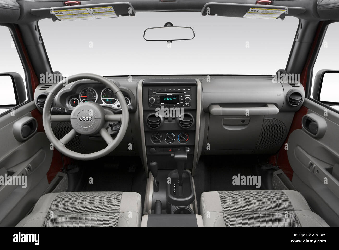 2007 Jeep Wrangler Sahara in Red - Dashboard, center console, gear shifter  view Stock Photo - Alamy