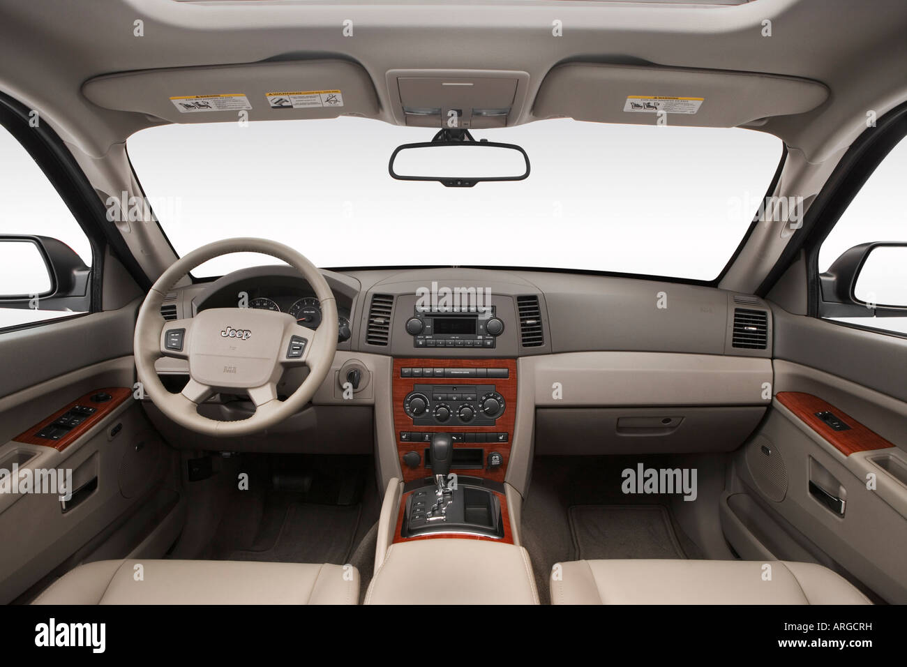 2007 Jeep Grand Cherokee Limited in Gray - Dashboard, center console, gear shifter view Stock Photo