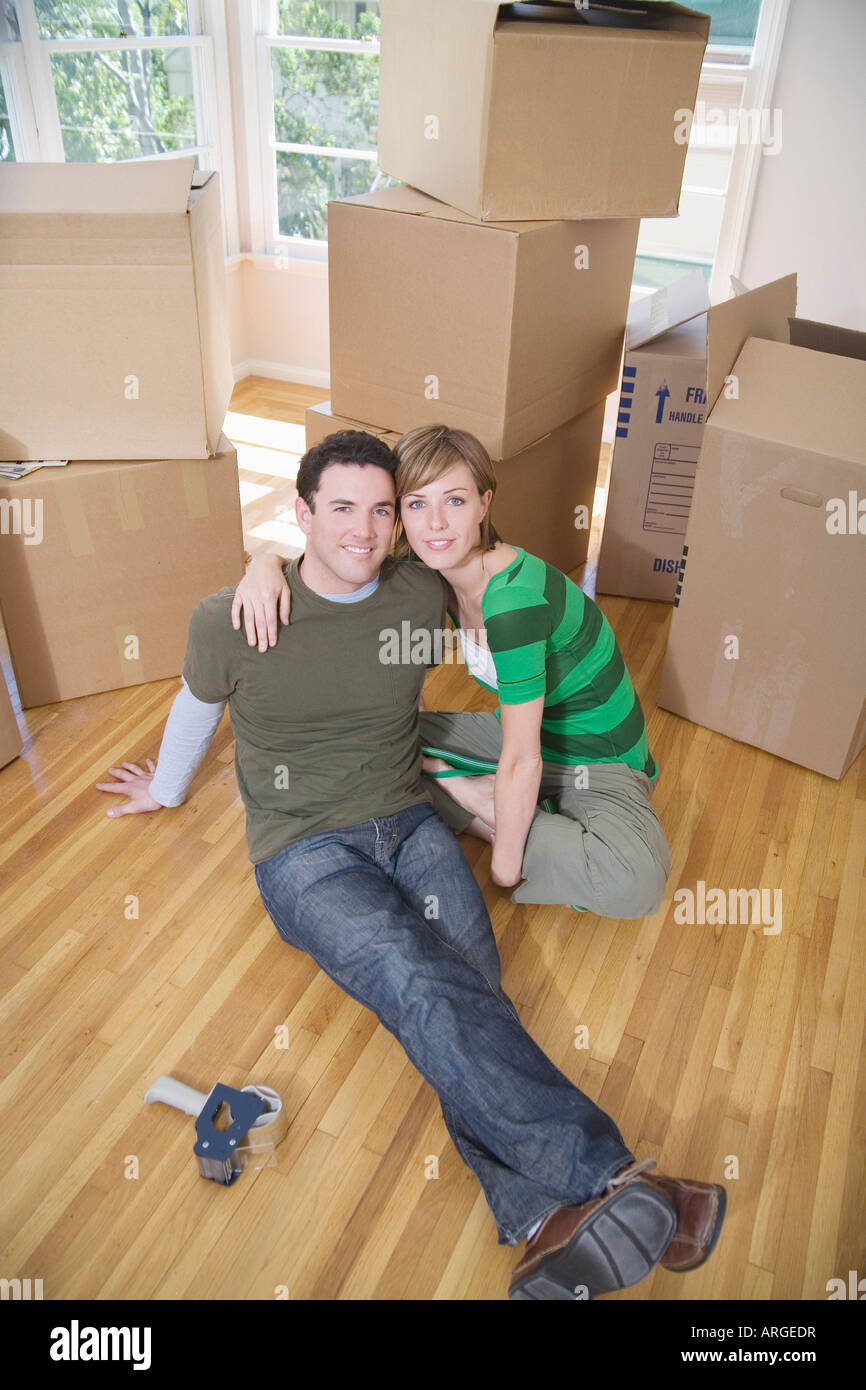 Couple Moving Into New Home Stock Photo - Alamy