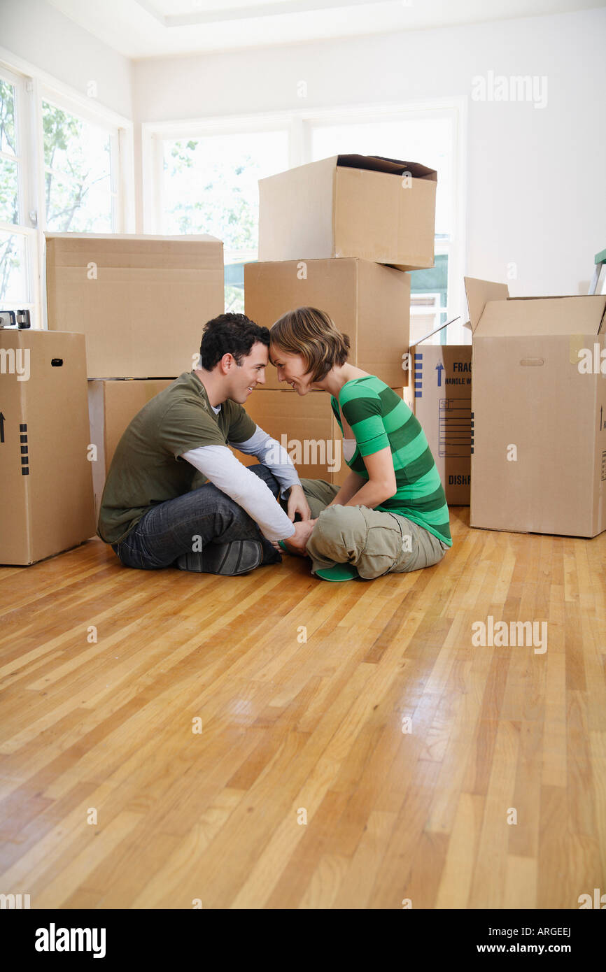 Couple Moving Into New Home Stock Photo - Alamy