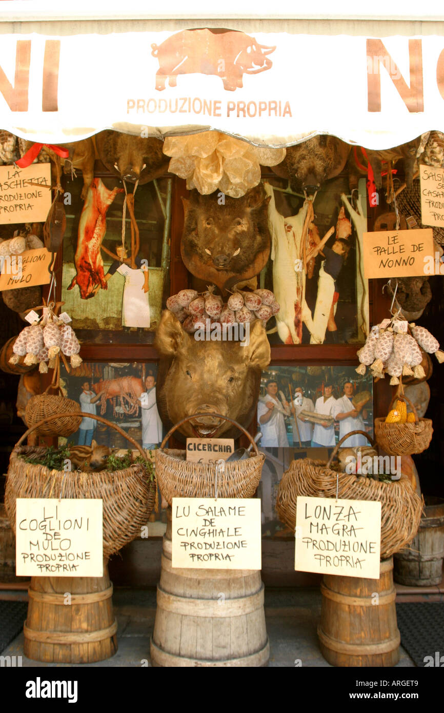 local produce on display outside one of the many foodshops in NORCIA gourmet capital of Umbria in Italy Stock Photo