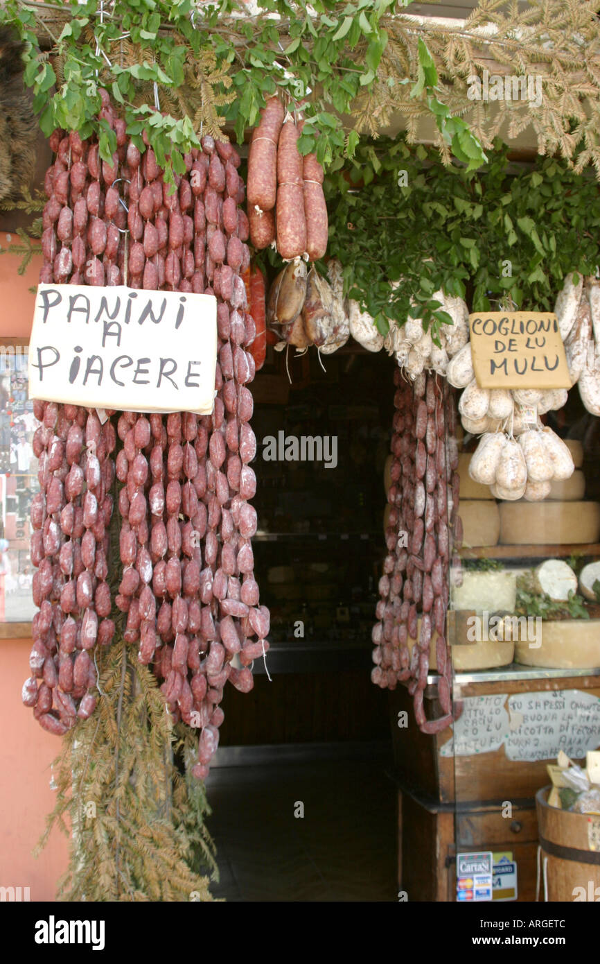local produce on display outside one of the many foodshops in NORCIA gourmet capital of Umbria in Italy Stock Photo