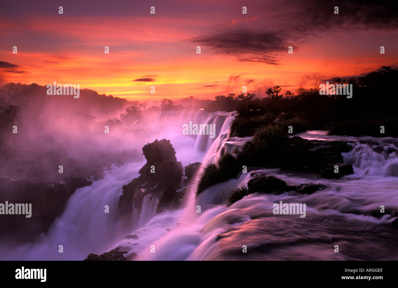 Iguazu Falls at Sunrise, Iguazu National Park, Misiones, Argentina Stock Photo