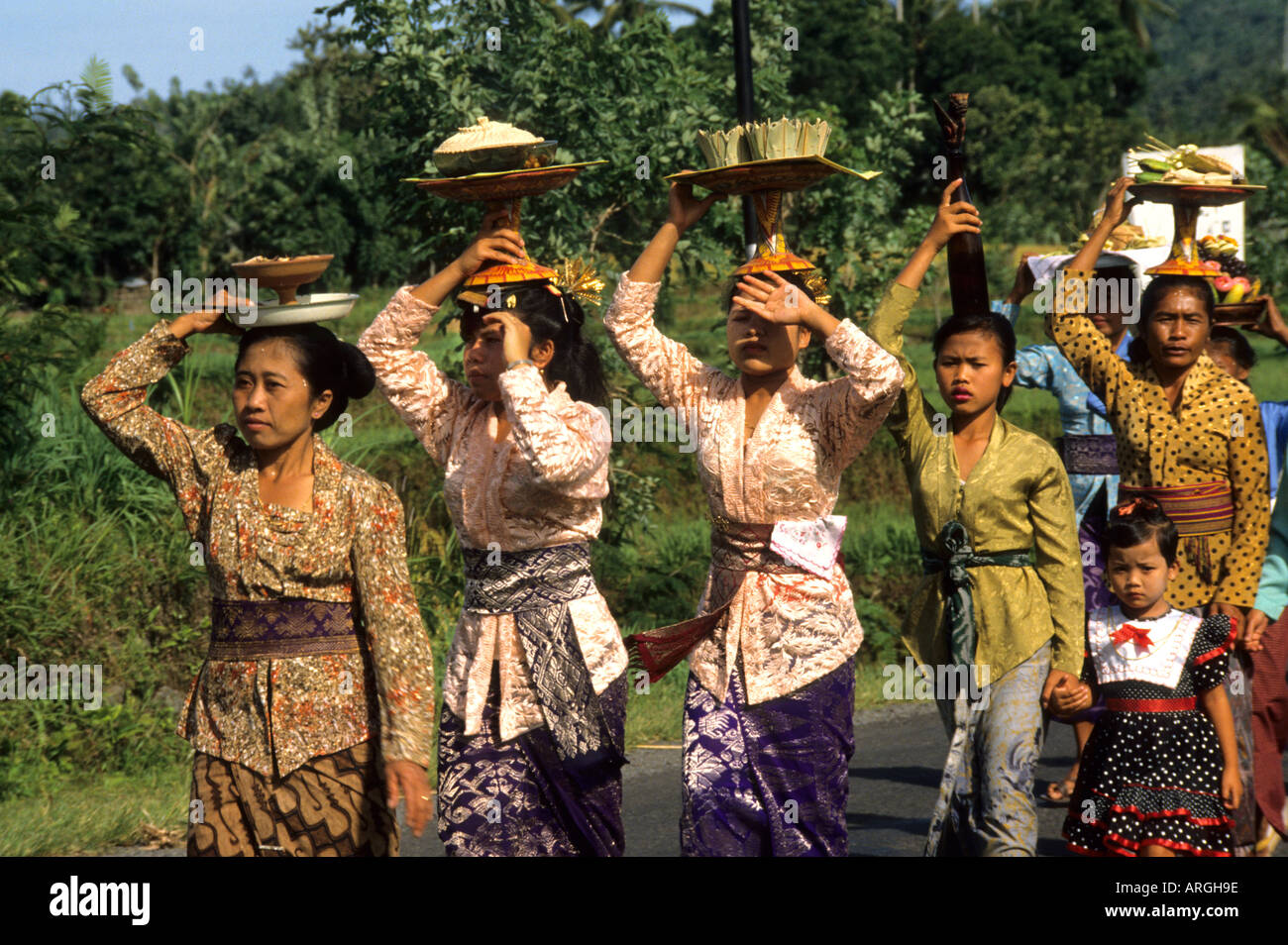Balinese funeral procession, body Carried to the cremation, bamboo, paper, silk, flowers, Hindu universe, crowd, group, people, men, women, Indonesia, Stock Photo
