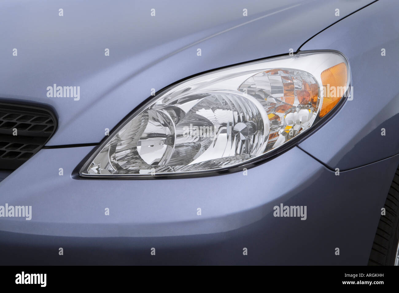 2007 Toyota Corolla Matrix in Blue - Headlight Stock Photo - Alamy