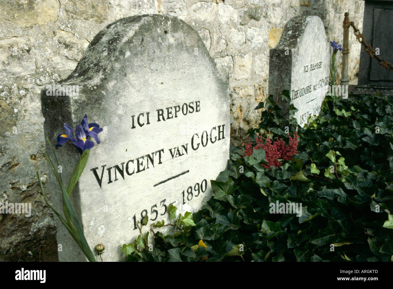 An Iris Growing Beside The Stone Marking The Grave Of Vincent Van Gogh 