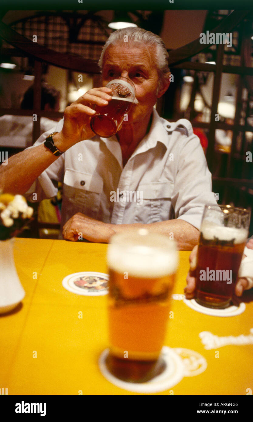 A customer sampling the product in the beer tavern of the West Bohemian Brewery founded in 1842 and home to the lager Pilsner Urquell Pilsen s Original Source in the town of Plzen Stock Photo
