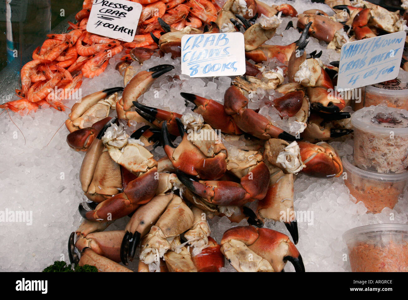 Crab claws for sale on the fishmongers stall at Borough Market London