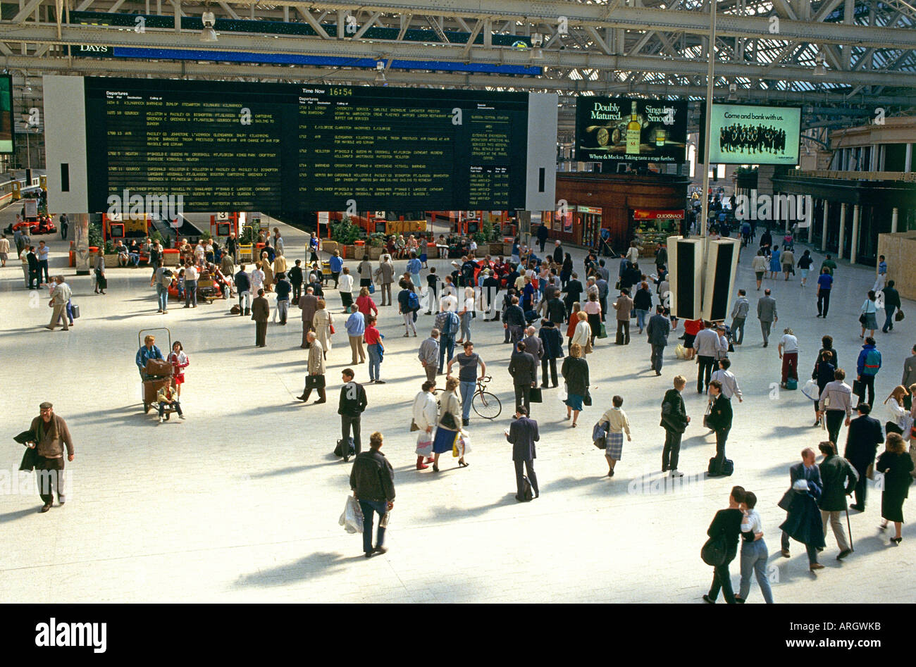 Crowds awaiting arrivals and departures from Glasgow Central Station