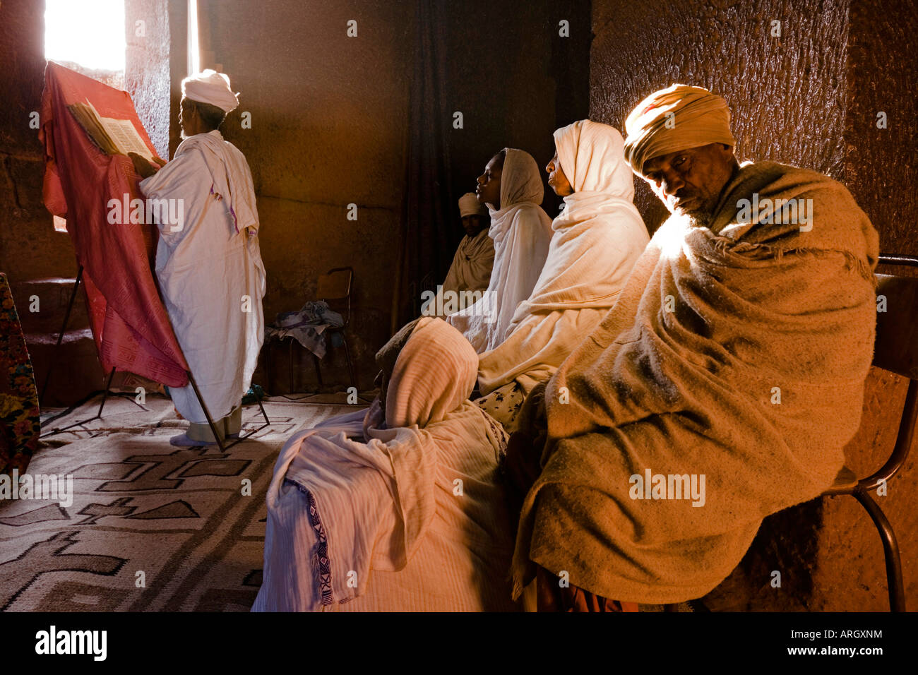 Group of people praying in a church, St. Gabriel Church, Lalibela, Ethiopia Stock Photo