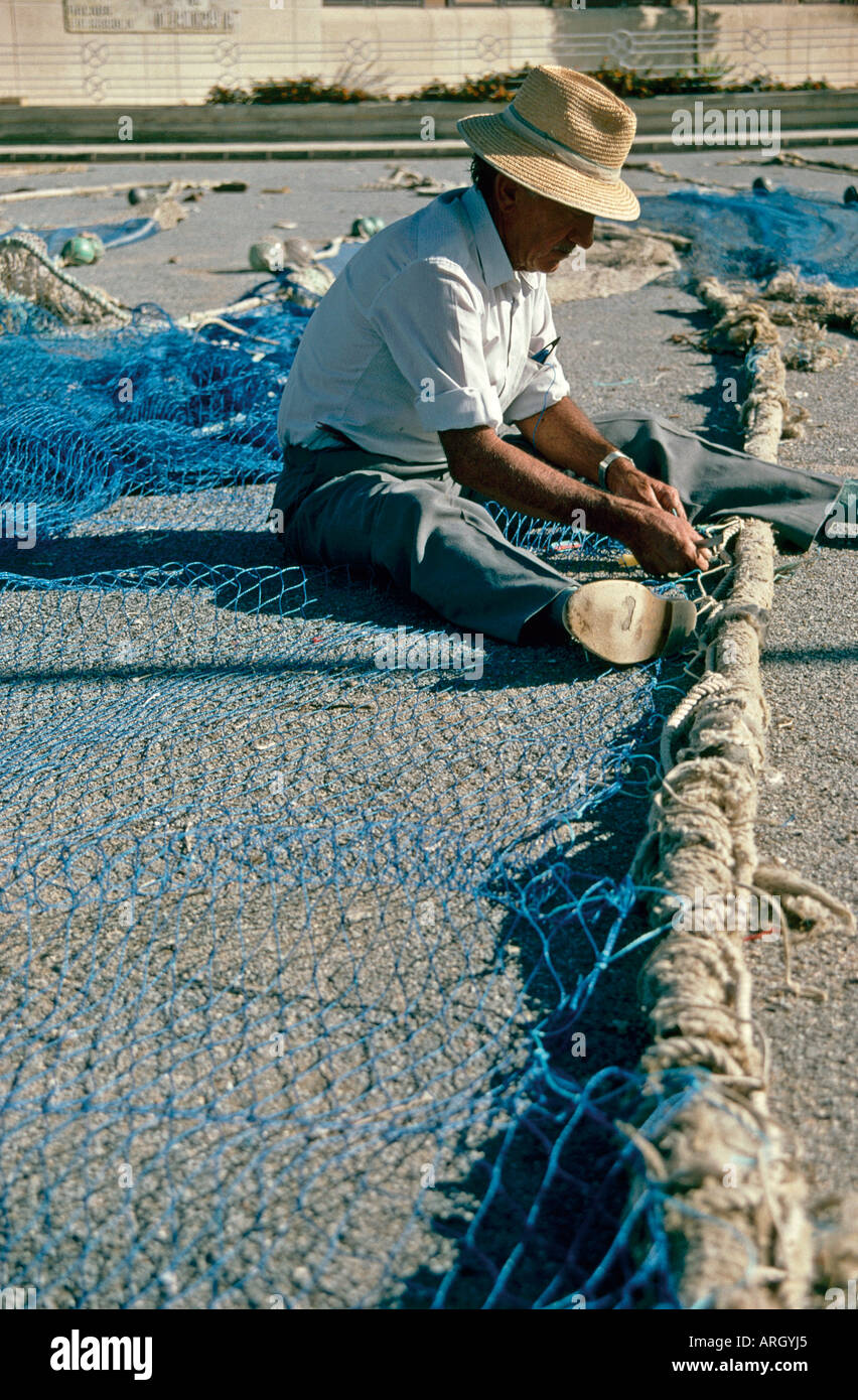 Man laid on a beach hi-res stock photography and images - Alamy