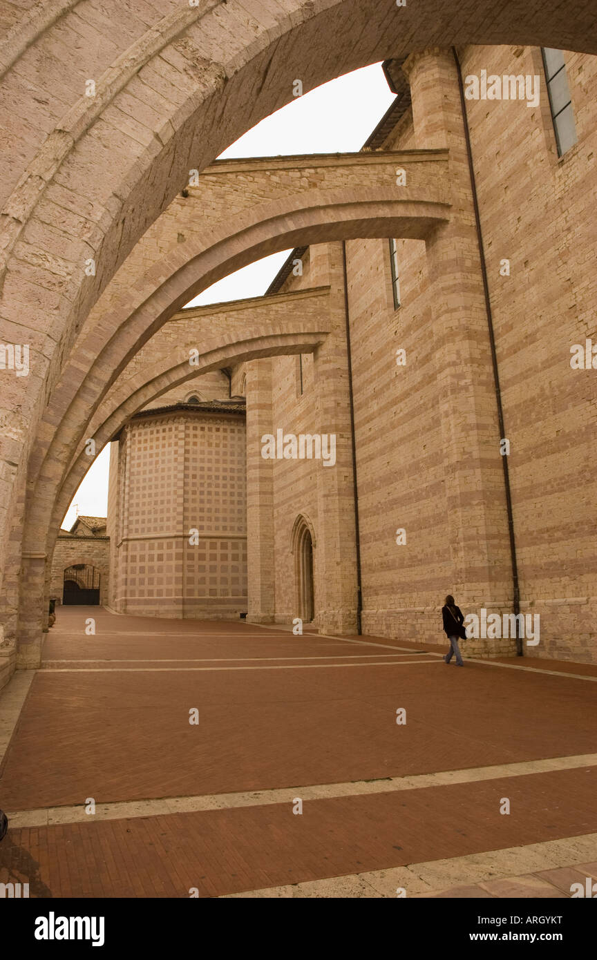 The huge rampant archs of the Santa Chiara Saint Clare basilica in Assisi Umbria Italy Stock Photo