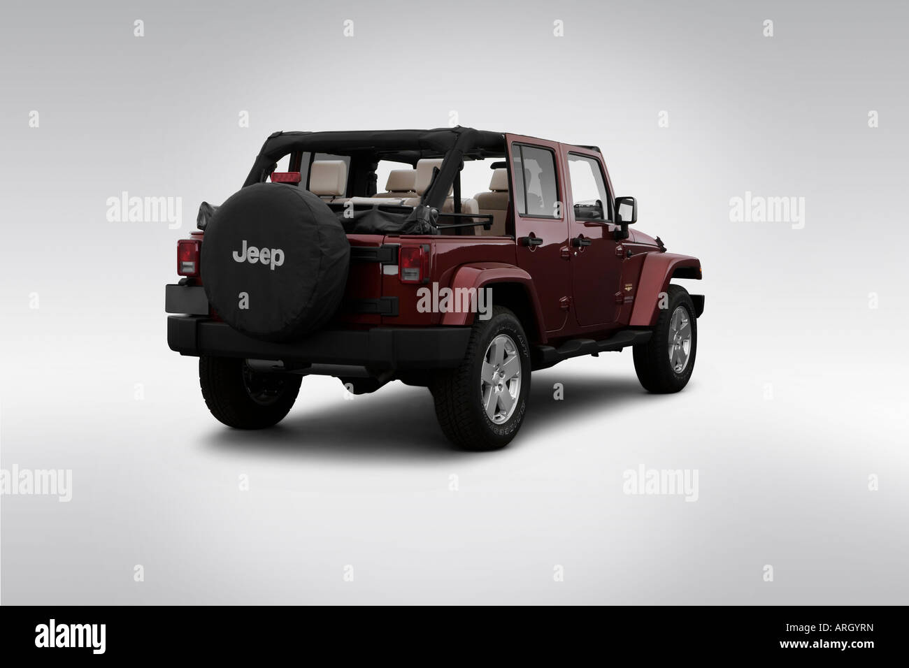 2007 Jeep Wrangler Unlimited Sahara in Red - Rear angle view Stock Photo -  Alamy