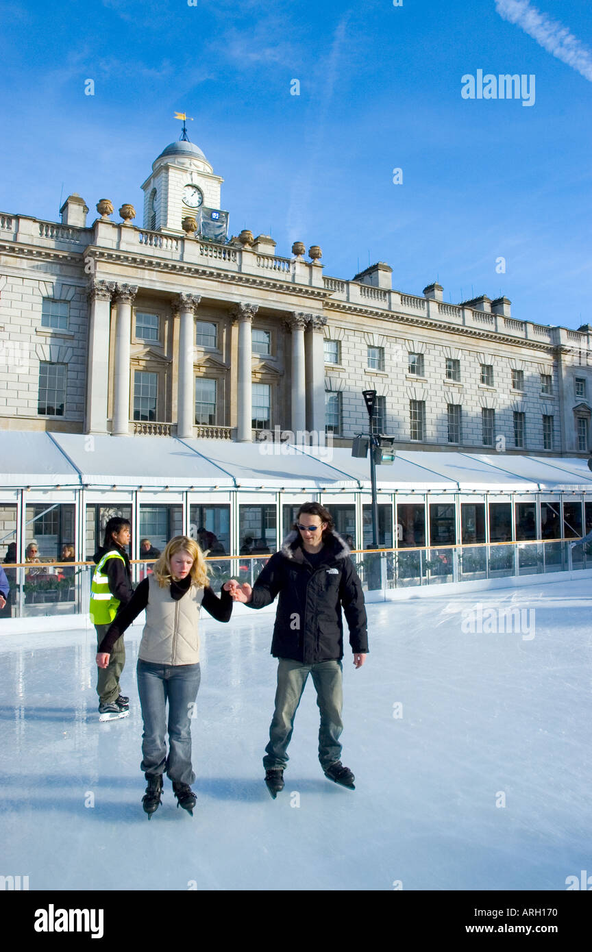 Skating on the ice rink at somerset house hi-res stock photography and ...