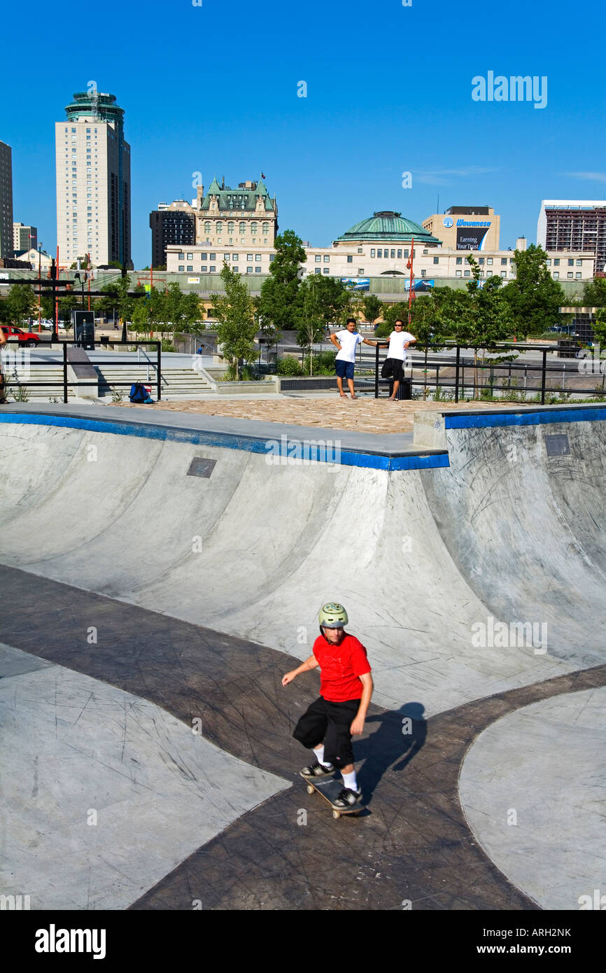 High angle view of a man skateboarding, The Forks, Winnipeg, Manitoba, Canada Stock Photo